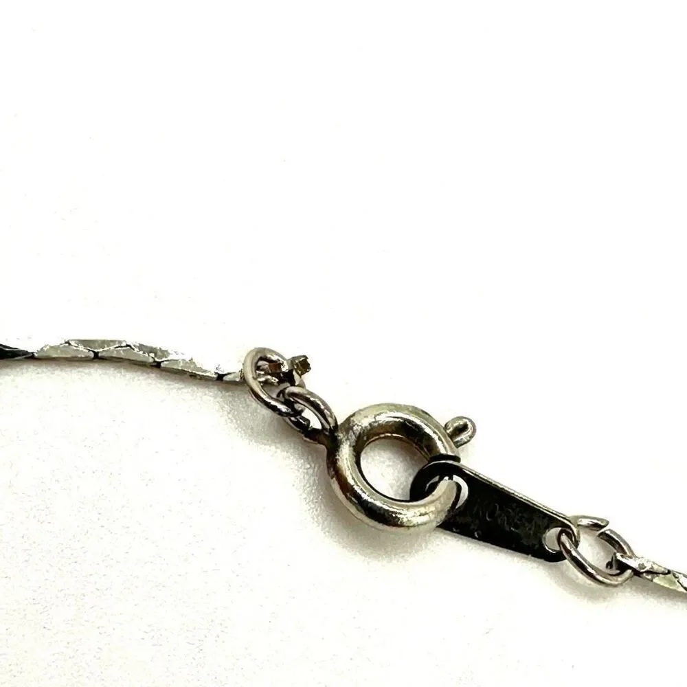 Black and silver tone long beaded necklace